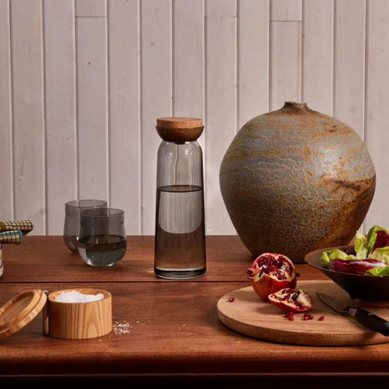 Holcomb Studio Teeter Carafe, Smoked | Hand-Blown Glass Beverage Pitcher with Ash Wood Top | Modern Carafe for Water, Juice, or Cocktails | Elegant Serveware & Hostess Gift Home Décor Accent 10.4"H